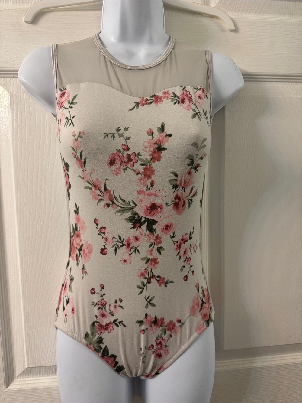 Floral Sleeveless Mesh Yoke leotard Beige/Pink. Size small.
